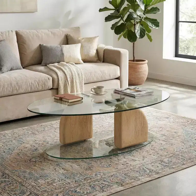 Table basse ovale en verre et béton léger