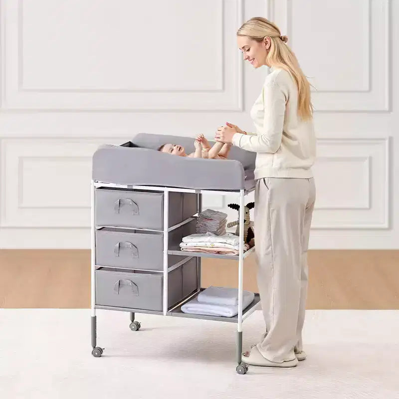 Table à langer portable avec 3 tiroirs et roulettes robuste